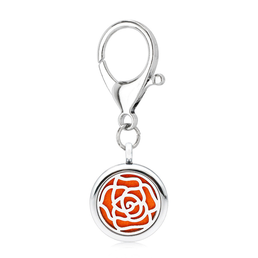 Wholesale 25MM Alloy Hollow New Flower Wings Aromatherapy Essential Oil Keychain